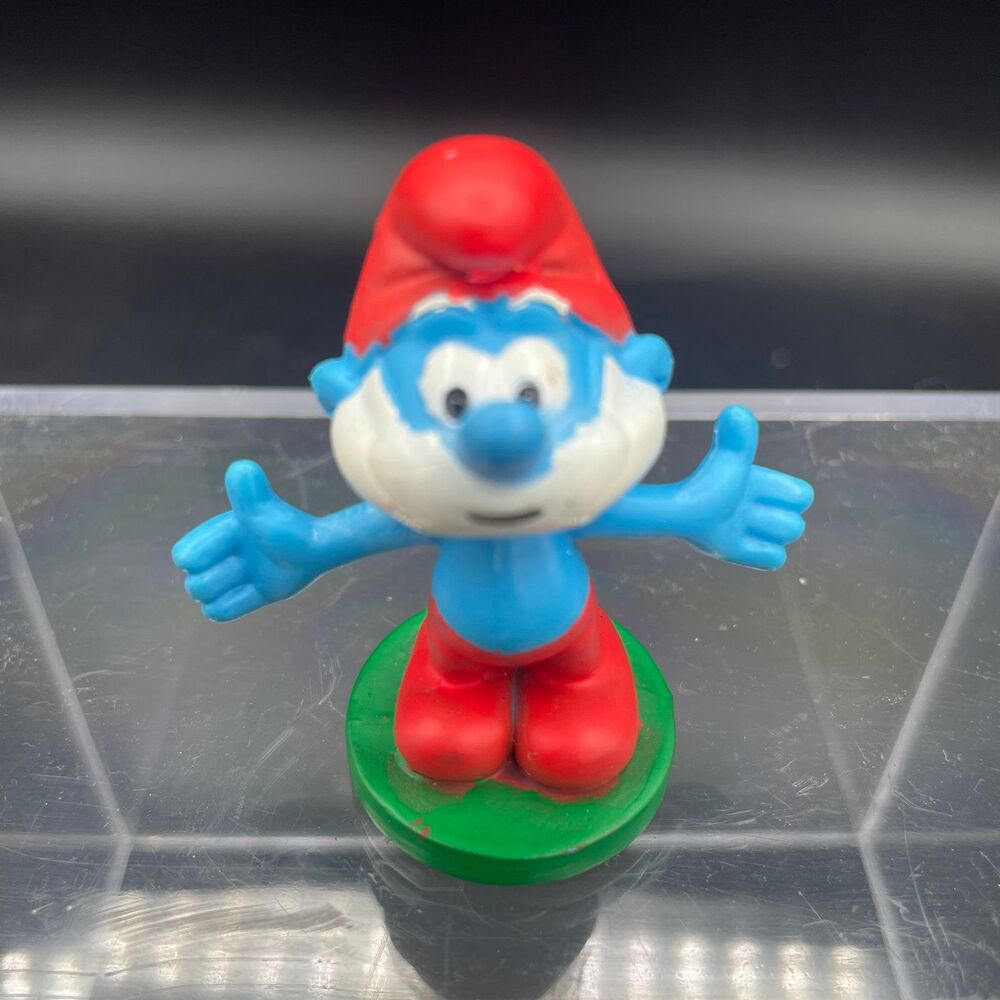 Vintage 2010 Peyo Smurf Figurine on Green Base PVC Toy Collectible